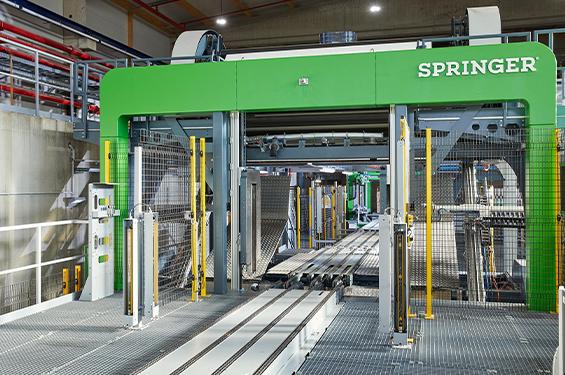 ED 3000 Wrapper: Die vollautomatische Verpackungsmaschine für Schnittholzpakete von SPRINGER Maschinenbau.
